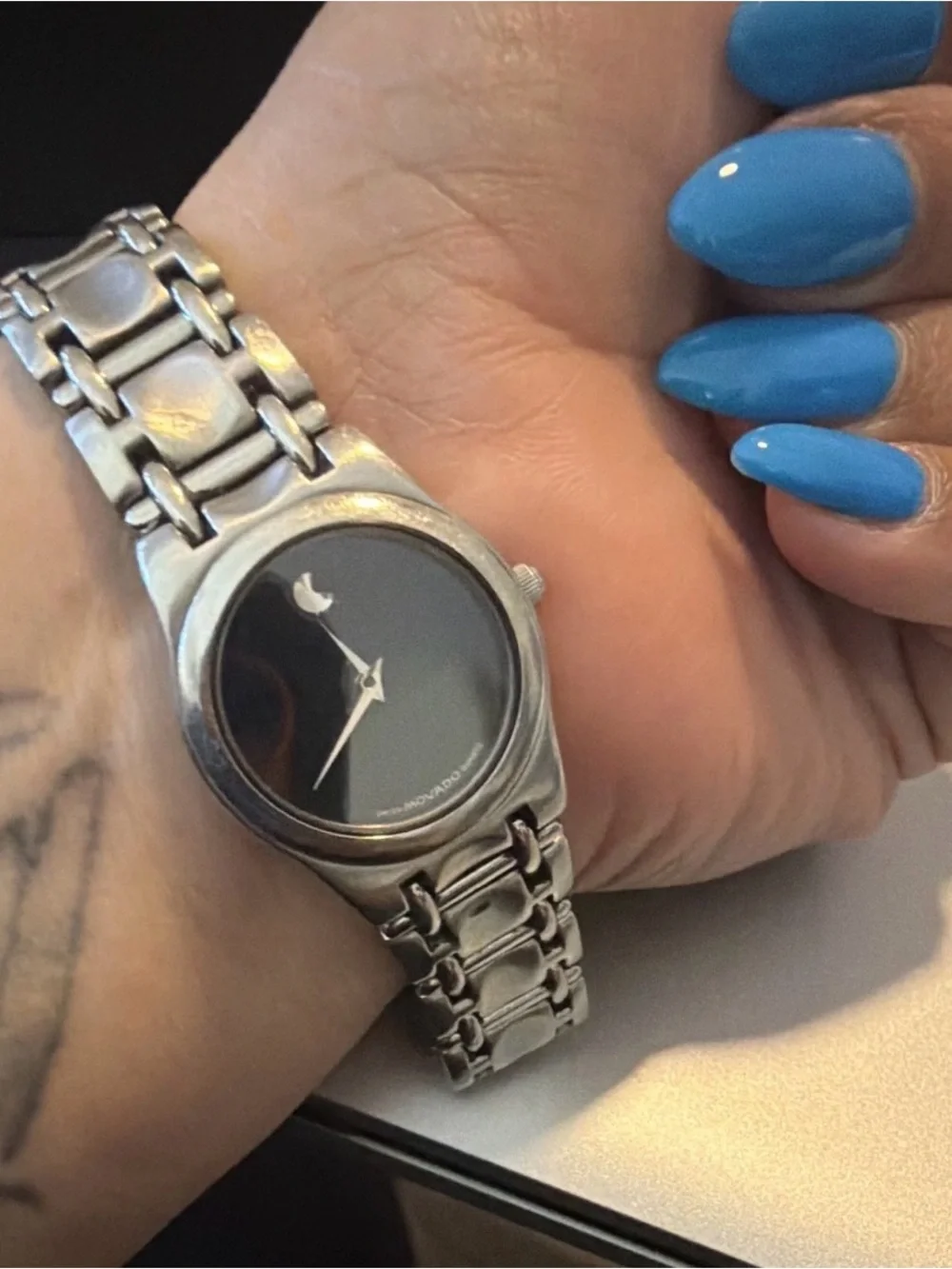 Movado Silver Bracelet Watch with Black Dial